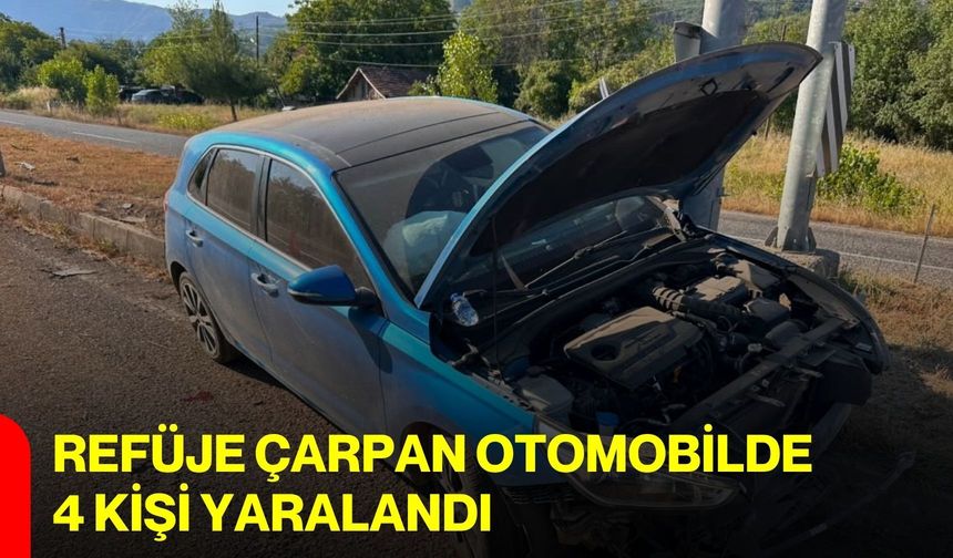 Refüje çarpan otomobilde 4 kişi yaralandı