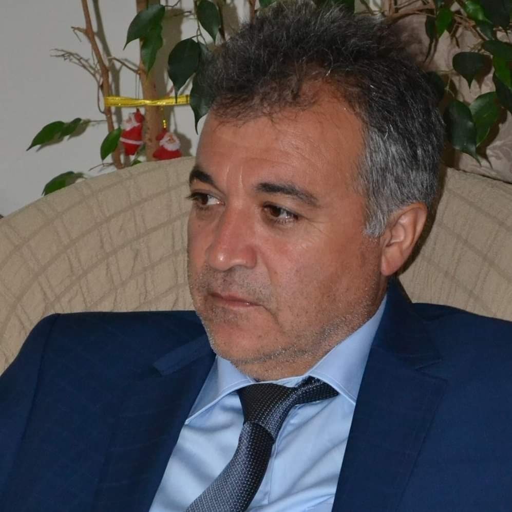 komş