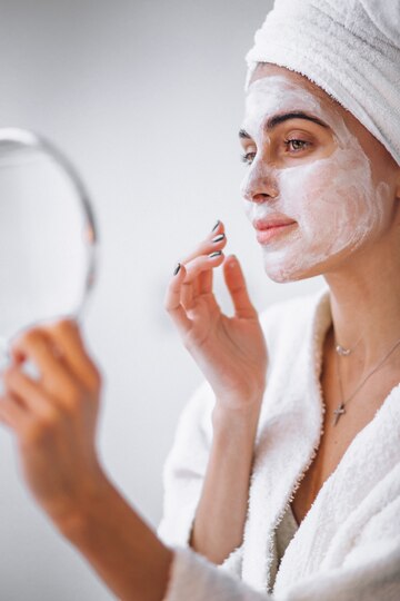 Woman Applying Beauty Mask 1303 13042